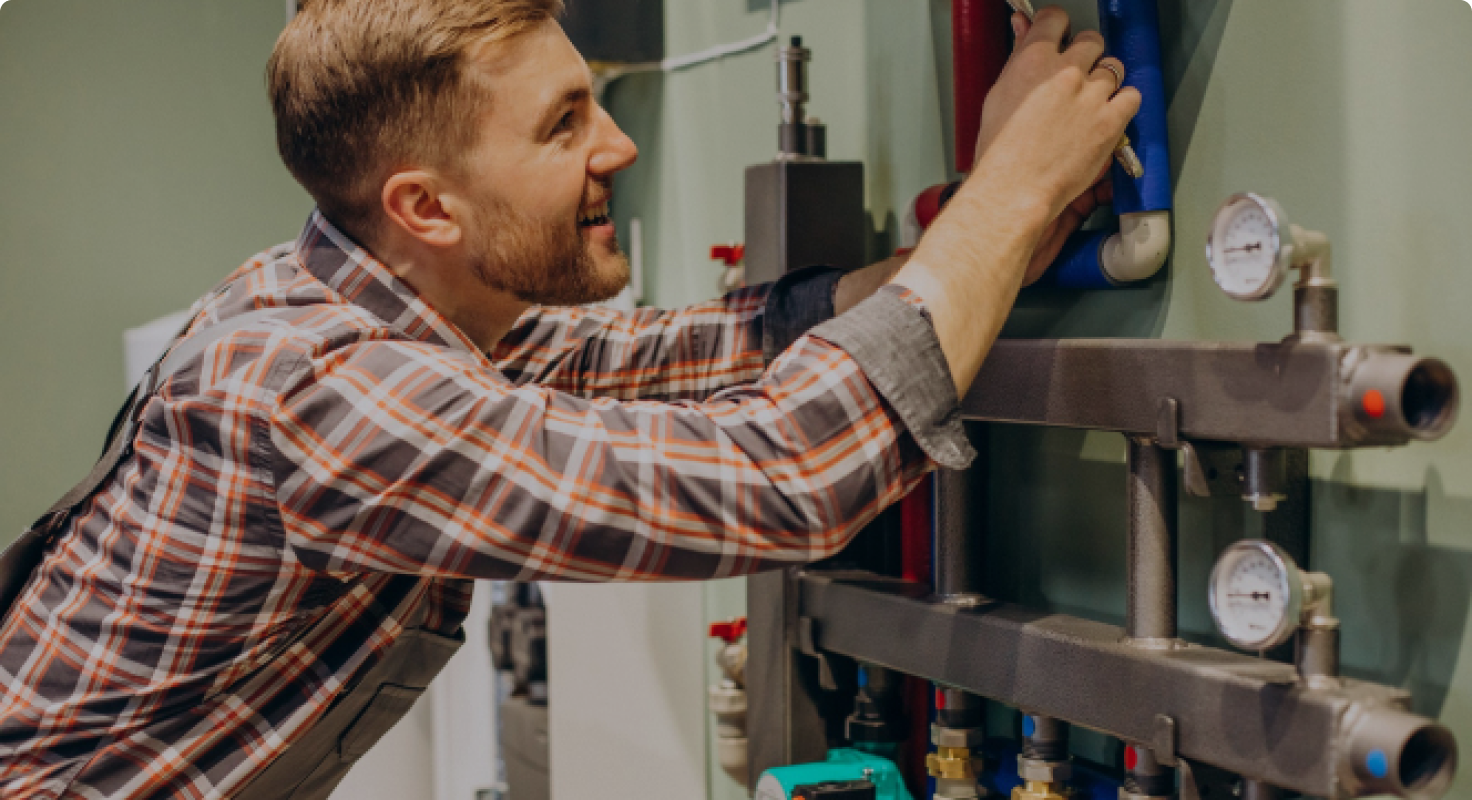 Plumber Fixing Pipe
