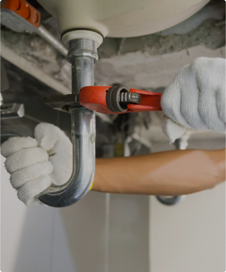 Plumber Fixing Pipe