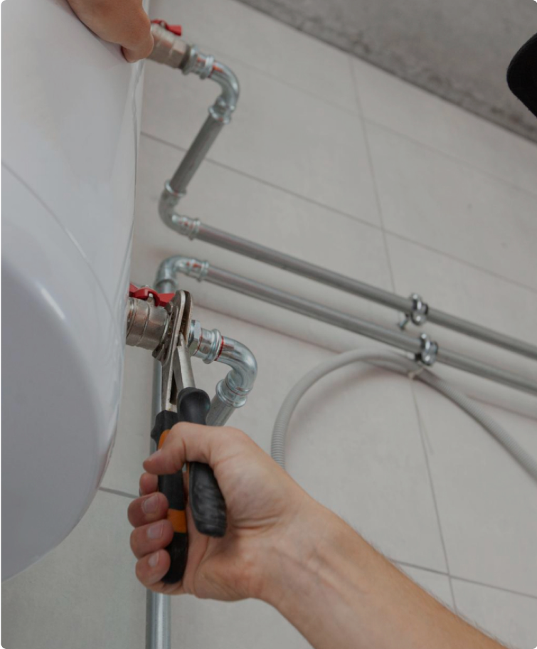 Plumber Fixing Pipe