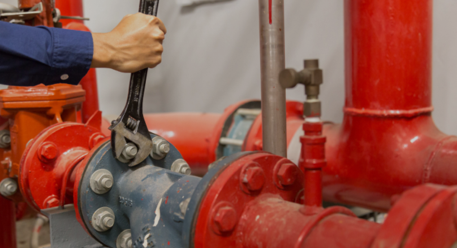 Plumber Fixing Pipe
