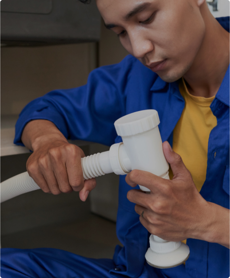 Plumber Fixing Pipe